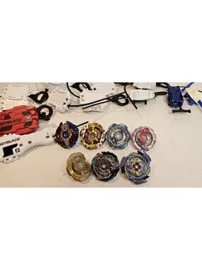 Takara Tomy Beyblade Bundle Lot Of 7 + 12 Launch Pullers